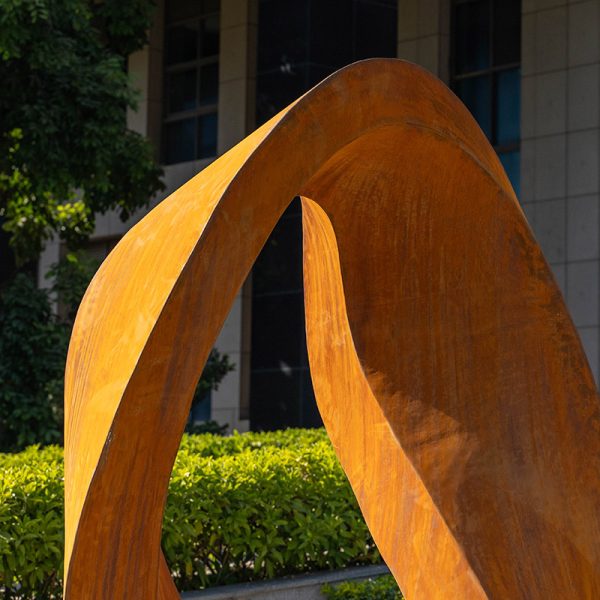 Modern corroded metal time ring sculpture - Image 3