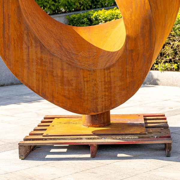 Modern corroded metal time ring sculpture - Image 2