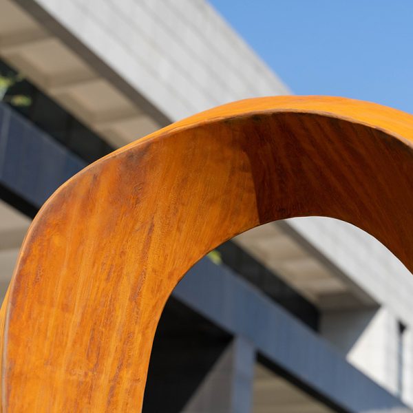 Modern corroded metal time ring sculpture - Image 4