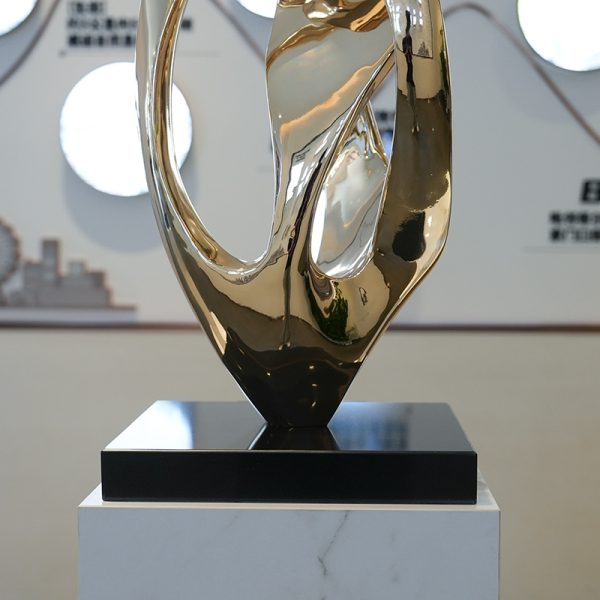 Modern stainless steel harmony ring sculpture artwork - Image 2